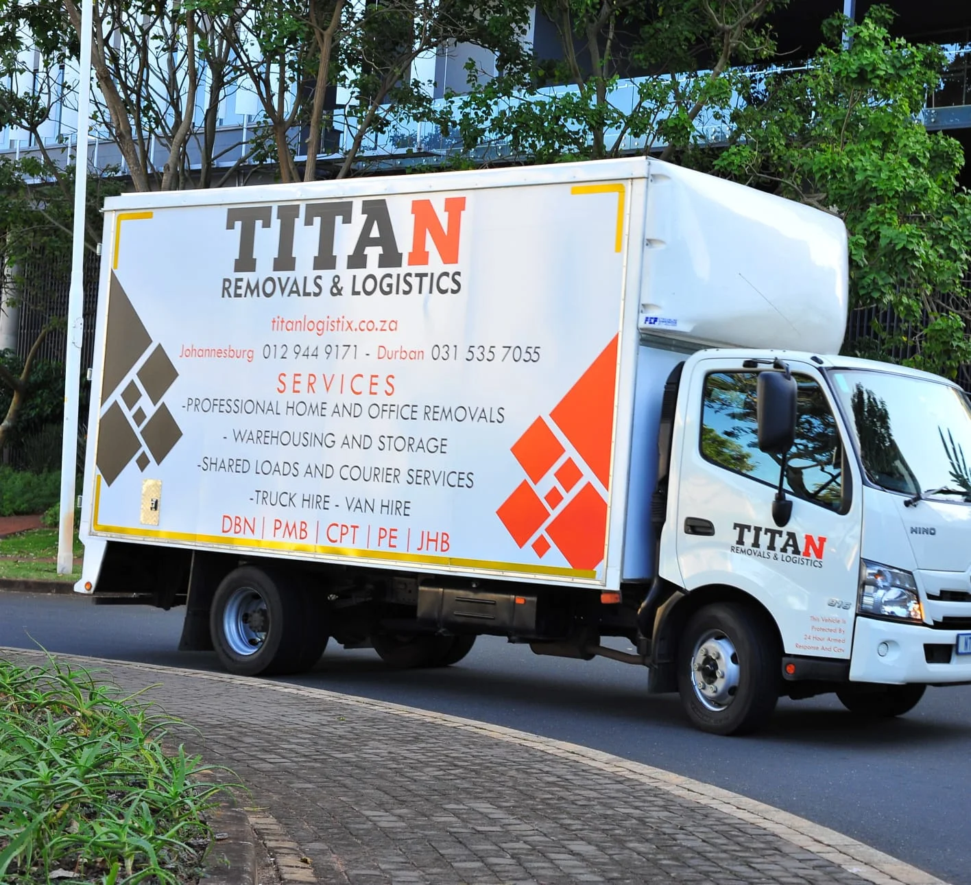 Titan Logistix white branded moving truck